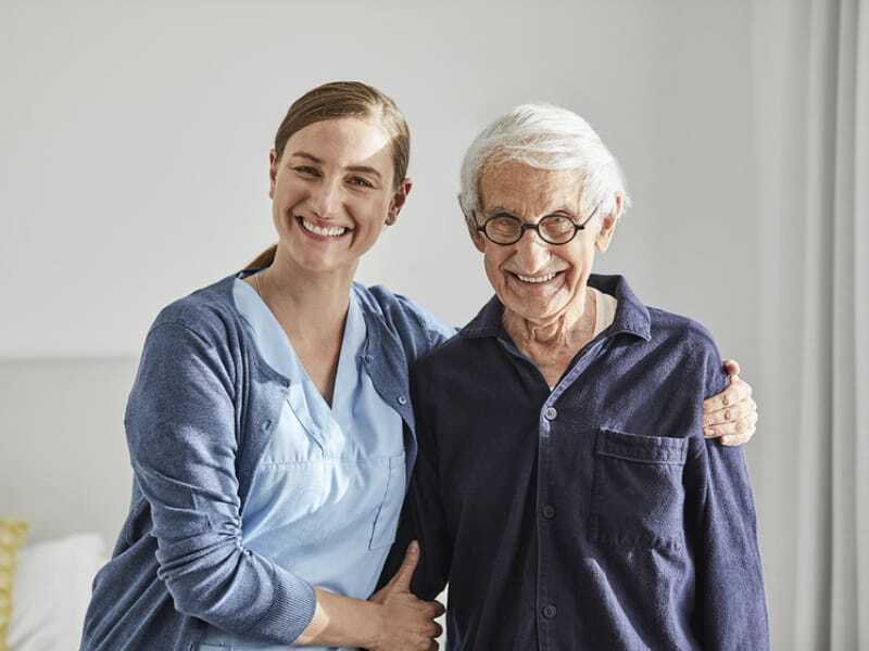 caregiver with senior male resident